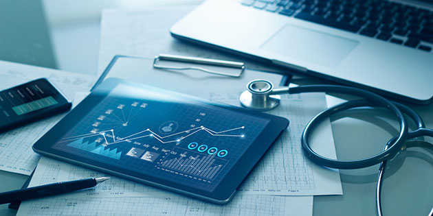 data dashboard on digital tablet by stethoscope