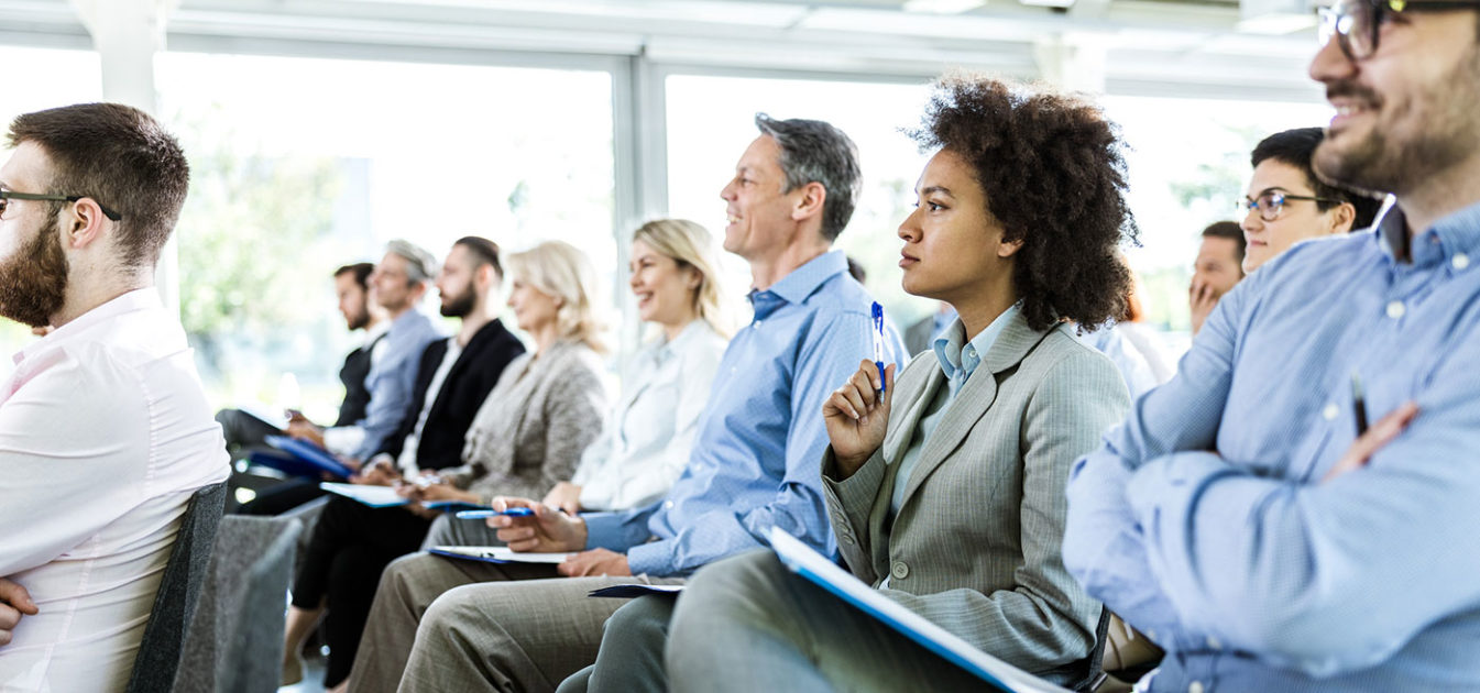 professionals attend an educational seminar