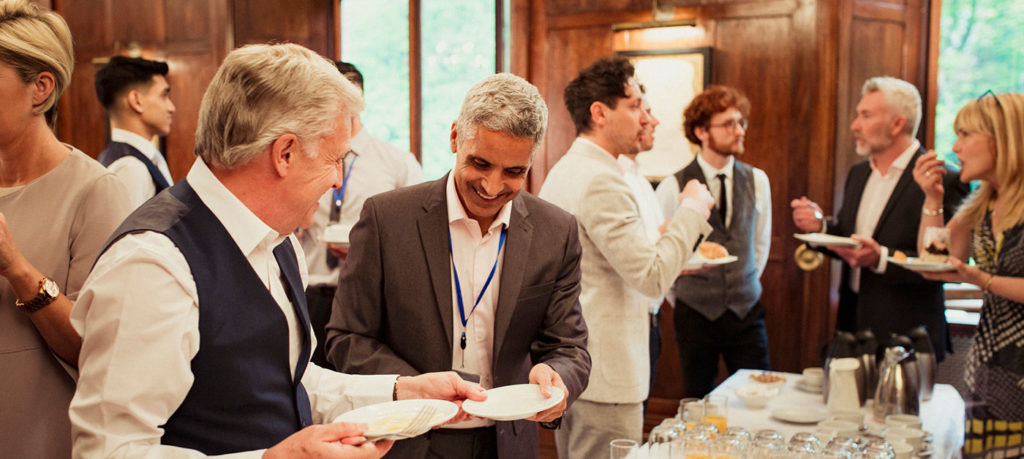 event attendees at post-event reception