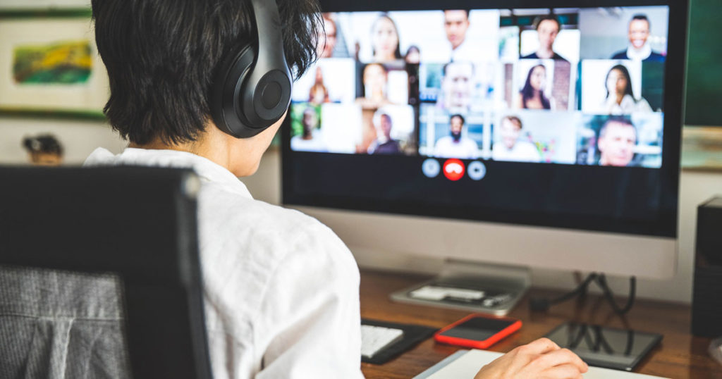 professional works remotely on conference video call