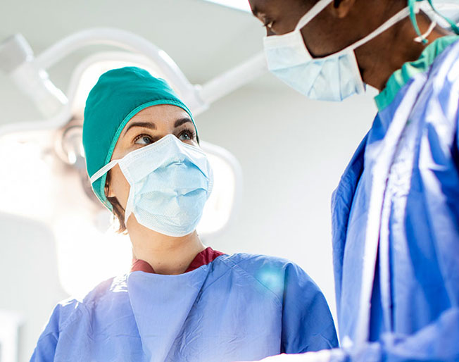 two surgeons in operating room