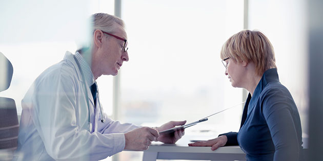 doctor discussing with patient