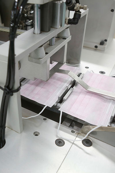 assembly line of protective face masks