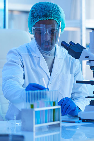 lab technician processing a test from vials