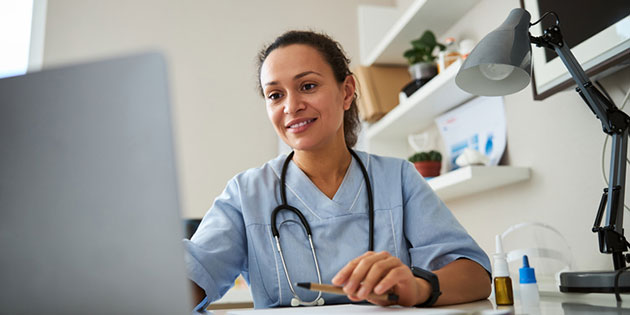 healthcare worker at computer
