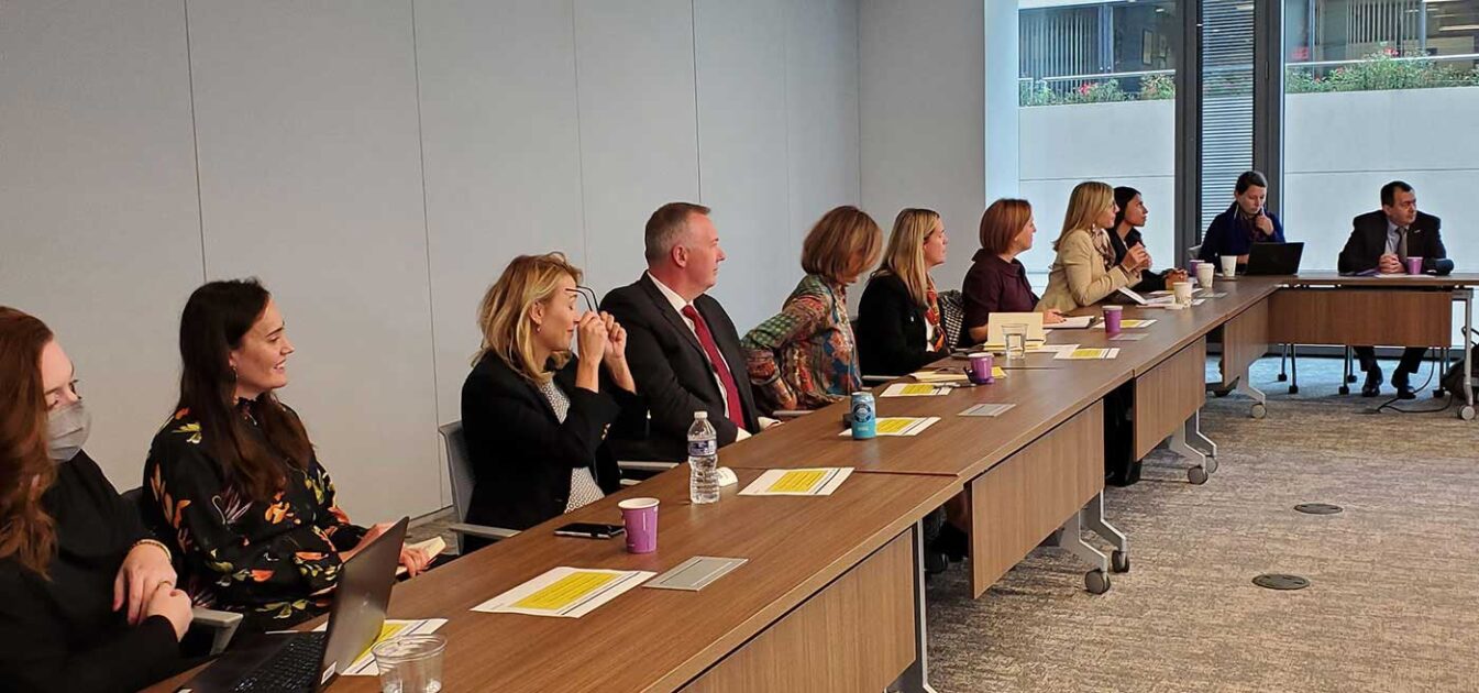 people gathered at a roundtable meeting