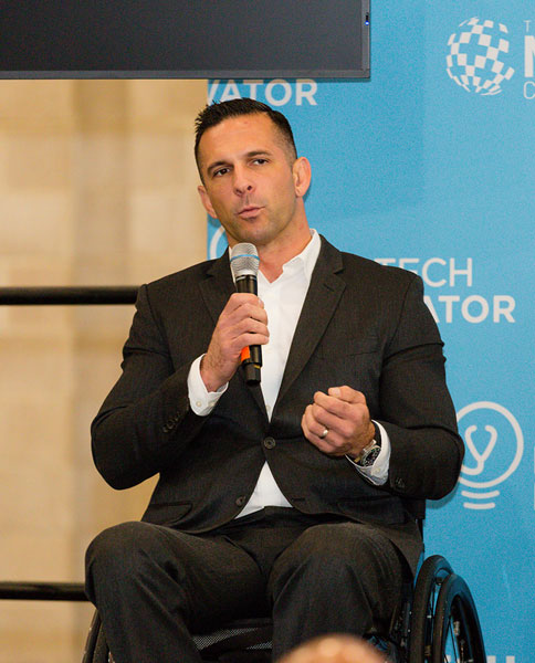 Derek Herrera speaking on a panel