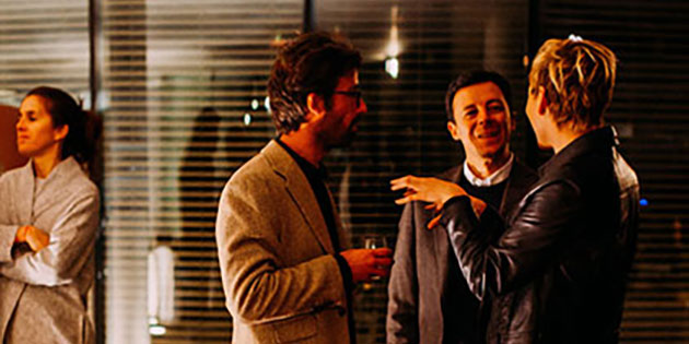 people mingle at a networking event