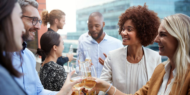 people drink wine together on a rooftop