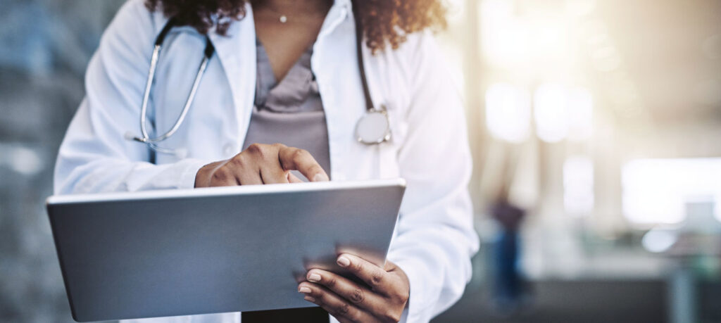 Clinician holding an iPad