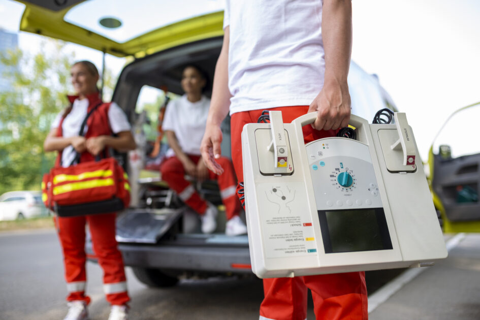 Hand of the doctor with defibrillator