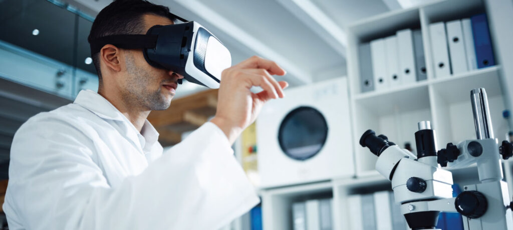 Doctor wearing VR goggles in front of a microscope