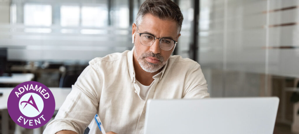 Focused middle-age man using laptop computer for business studying, watch online virtual webinar training meeting, video call, make notes. Mature Latin businessman work in office, copy space