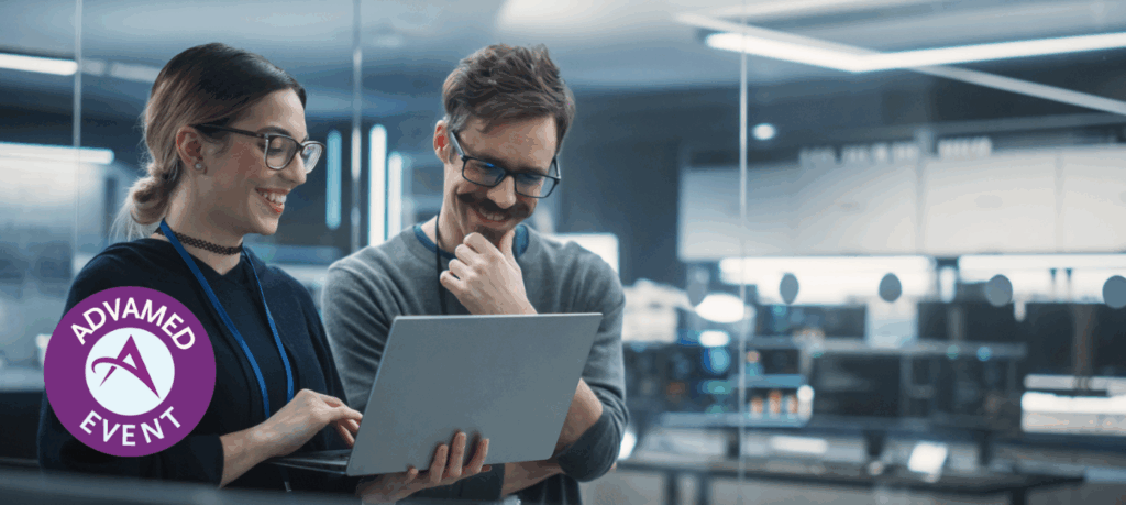 Portrait of Two Creative Young Female and Male Engineers Using Laptop Computer to Analyze and Discuss How to Proceed with the Artificial Intelligence Software. Standing in High Tech Research Office