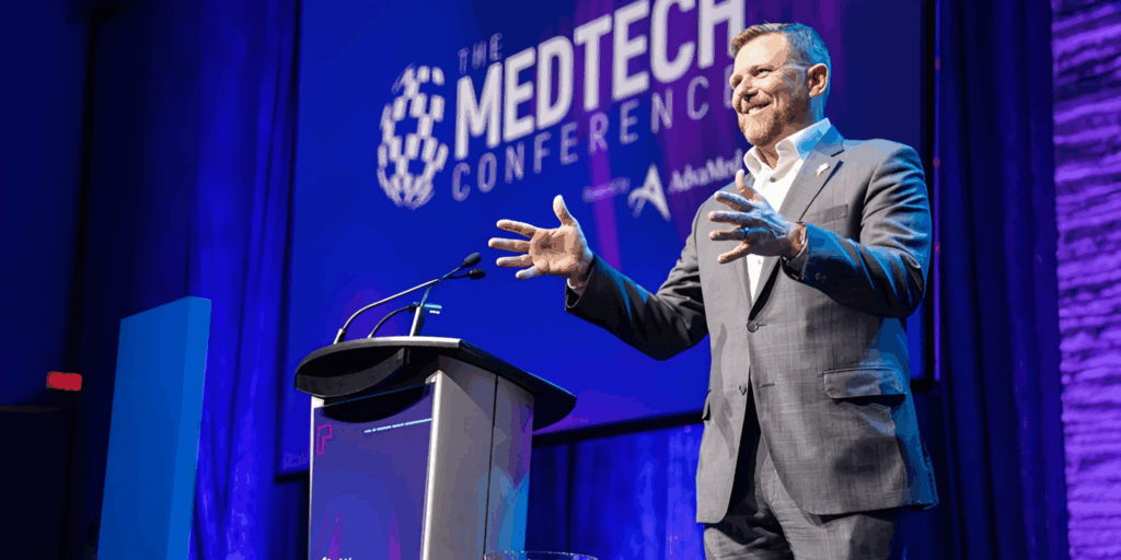 50 years of Medtech blog image of Scott Whitaker speaking at Medtech Conference