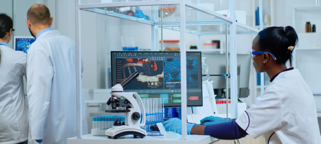 health care workers in the lab wearing lab coats