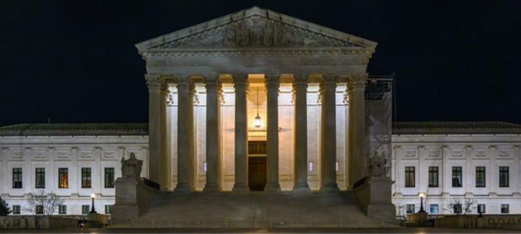 photo of supreme court at night